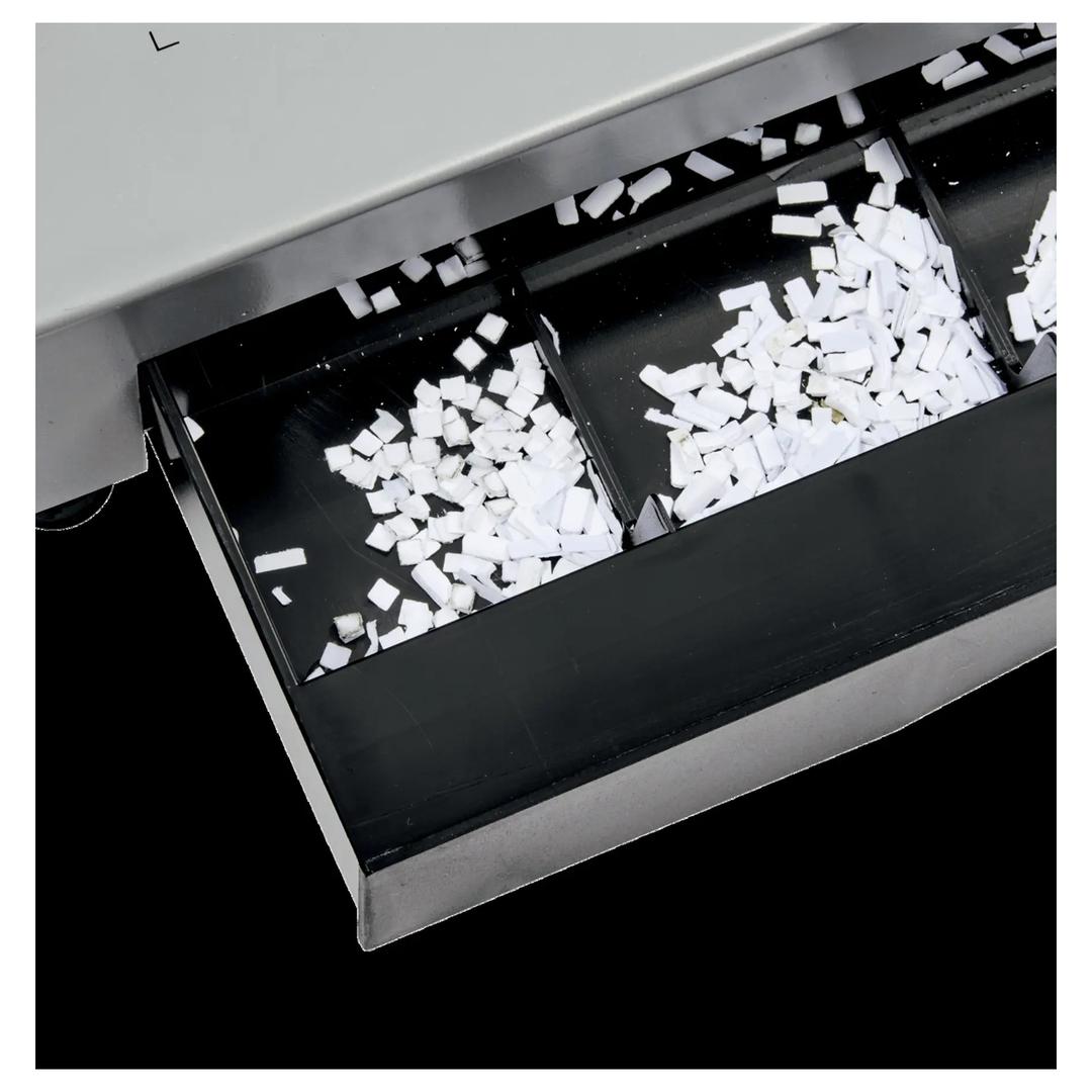Perforelieur électrique anneaux plastiques pas US CB25E Pro GBC — Et son bac à confettis après perforation des feuilles